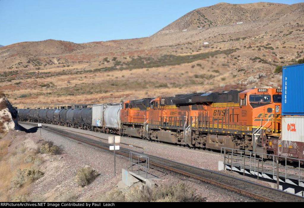 Eastbound ethanol empties attached to a stack train